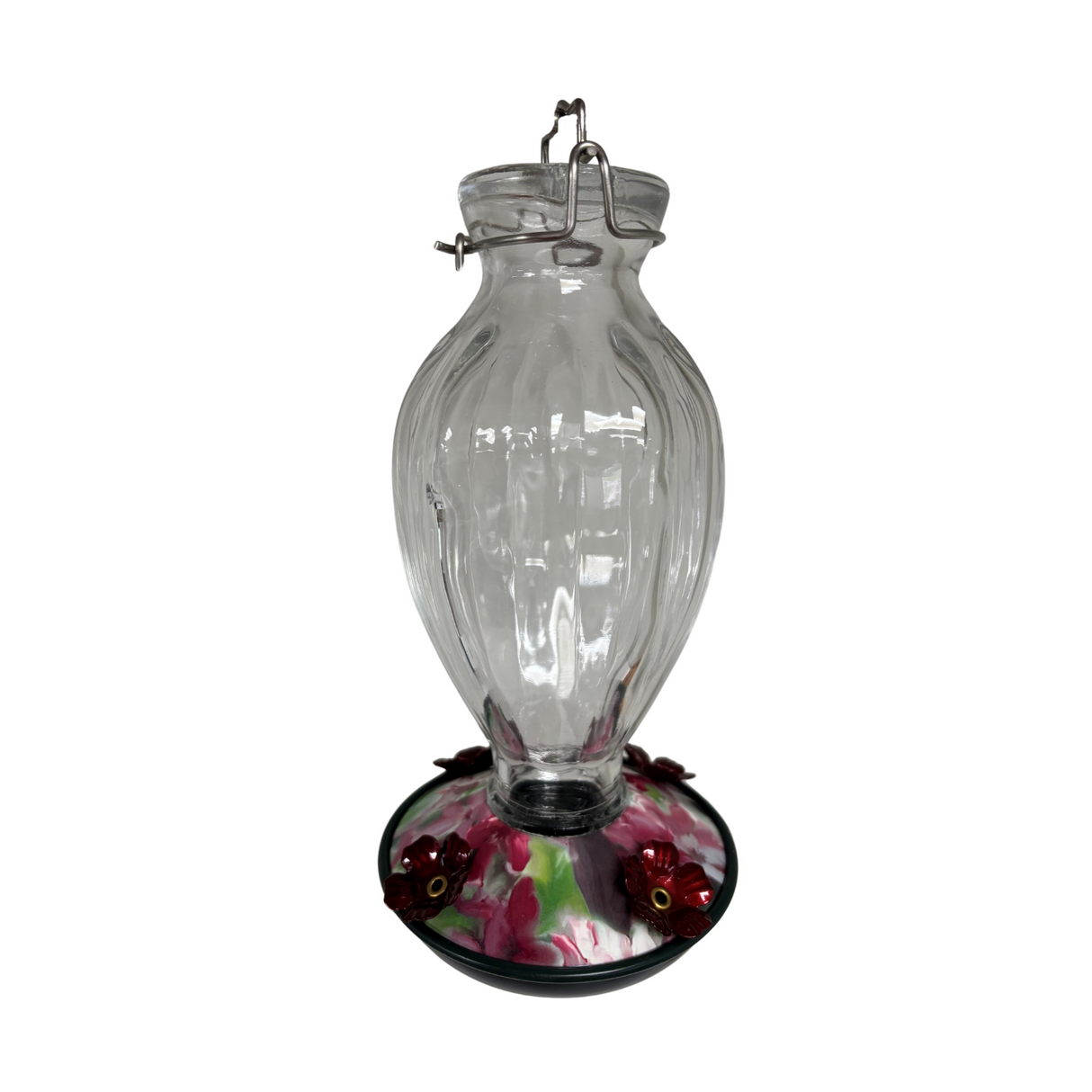 Glass hummingbird feeder with a ribbed clear glass reservoir and a dark green base featuring a floral design with burgundy flowers and accents.