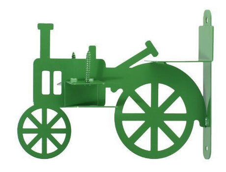 Metal wall-mounted green tractor shelf bracket featuring large spoked wheels a visible spring and a detailed engine design
