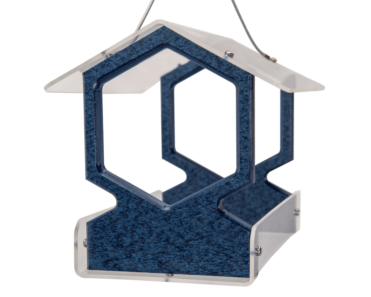 Product shot of a blue and clear acrylic bird feeder with a hexagonal design featuring a protective roof and clear acrylic sides showcasing its unique speckled texture and hanging wire.