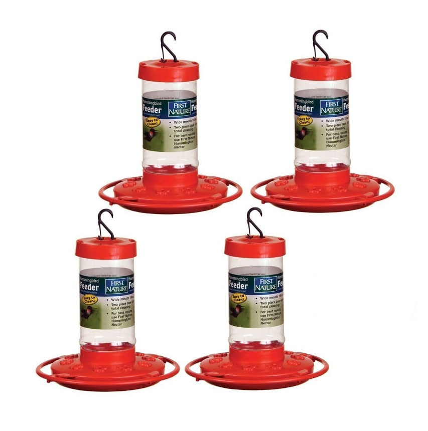 First Nature hummingbird feeders four red plastic feeders with clear nectar reservoirs and hanging hooks