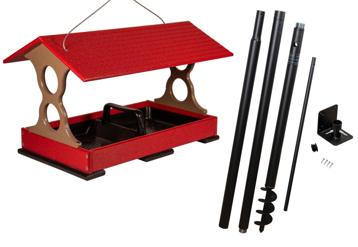 Product shot showing a red and taupe plastic bird feeder with a red roof, a black tray, and included mounting hardware for ground installation