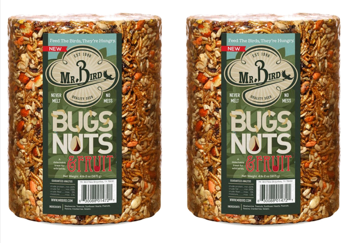 Mr. Bird product photography showing two cylindrical packages of Bugs Nuts & Fruit birdseed containing mealworms, sunflower seeds, and cranberries.