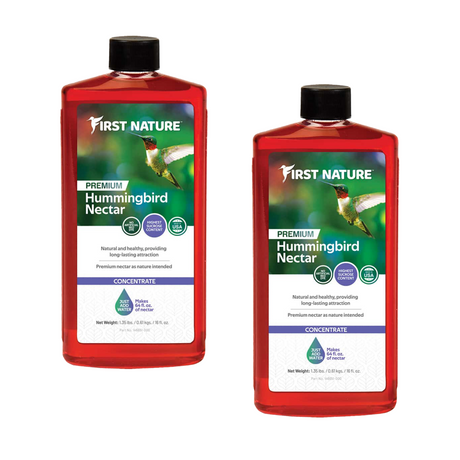 First Nature 3050 Red Hummingbird Nectar Concentrate 16 oz. bottles, premium formula for attracting hummingbirds.