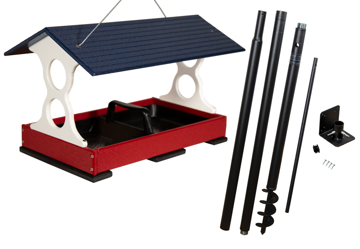 Product shot showing a red and white bird feeder with a navy blue roof and accompanying black metal ground post components including a ground auger