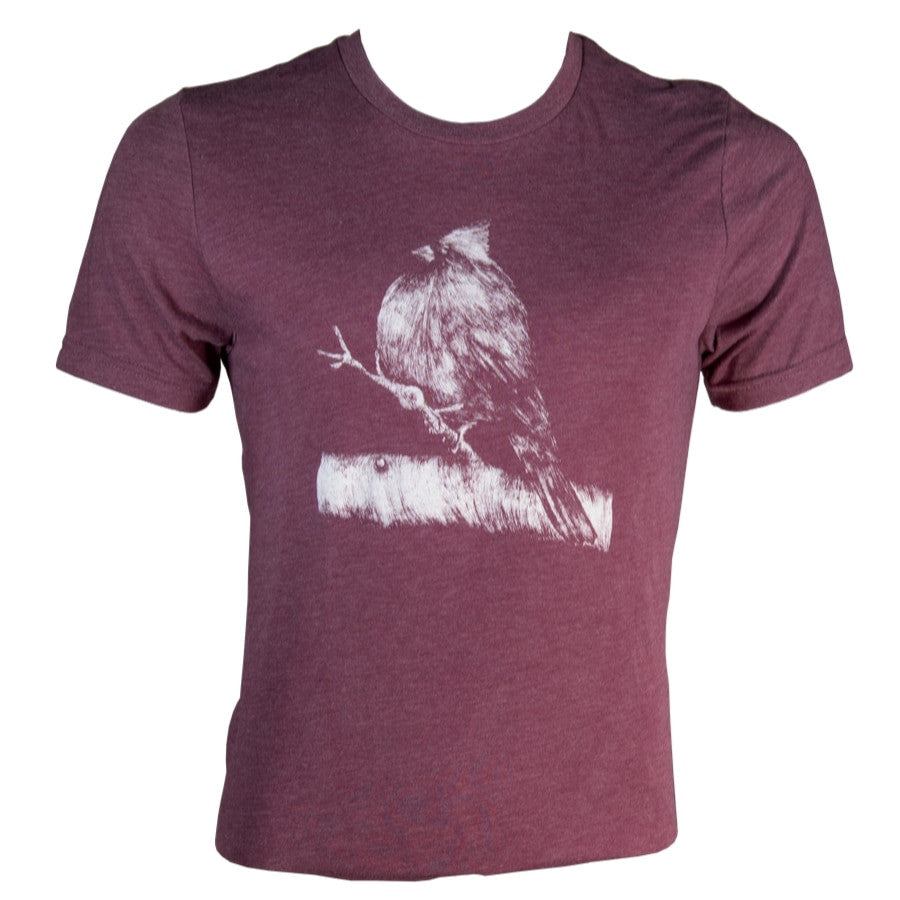 Crimson heather t-shirt featuring a white ink illustration of a northern cardinal perched on a branch with textured feathers and detailed twig