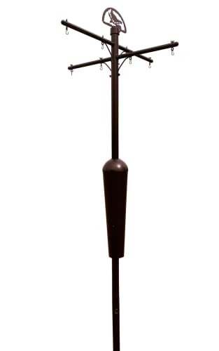 Squirrel Stopper Black Deluxe Squirrel Proof Pole System with Baffle for bird feeders in garden settings.