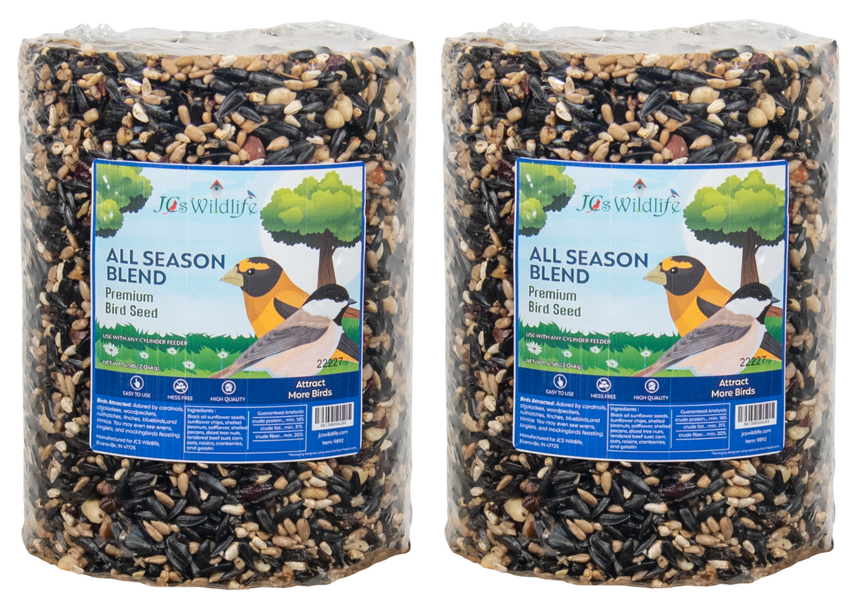 JCS Wildlife's All Season Blend premium bird seed in two packages shows black oil sunflower seeds, peanuts, and cranberries alongside images of cardinals and chickadees attracting more birds.