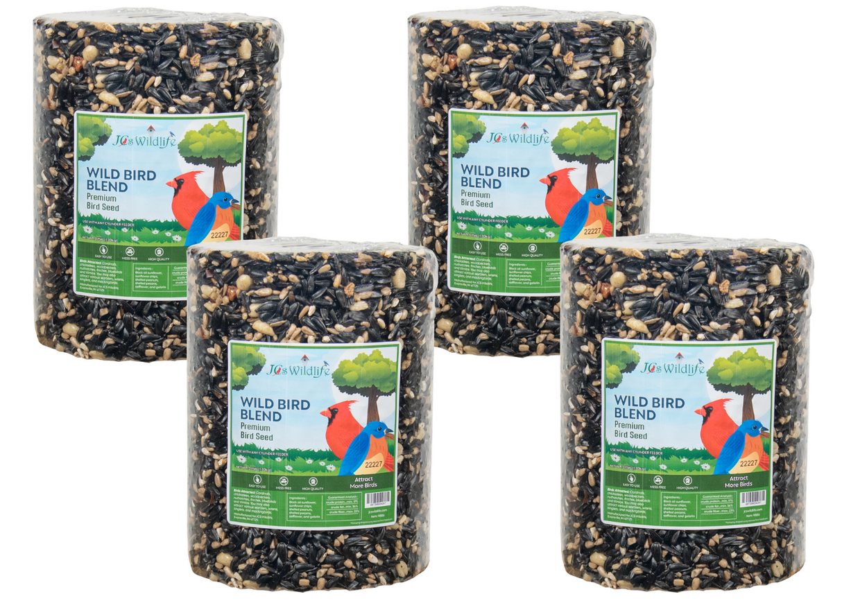 Product image showing four cylinders of Jo's Wildlife Premium Wild Bird Blend birdseed featuring sunflower seeds, peanuts, and other seeds with a cardinal and bluebird on the label