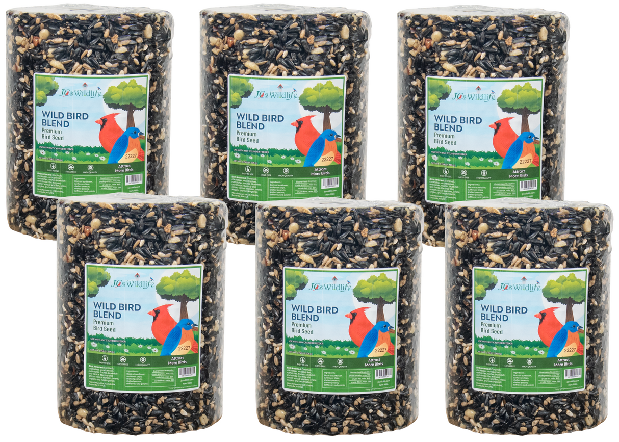 Jo's Wildlife six cylindrical packages of premium wild bird blend seed featuring a cardinal and bluebird against a tree backdrop with black oil sunflower seeds, peanuts, and other ingredients for attracting more birds