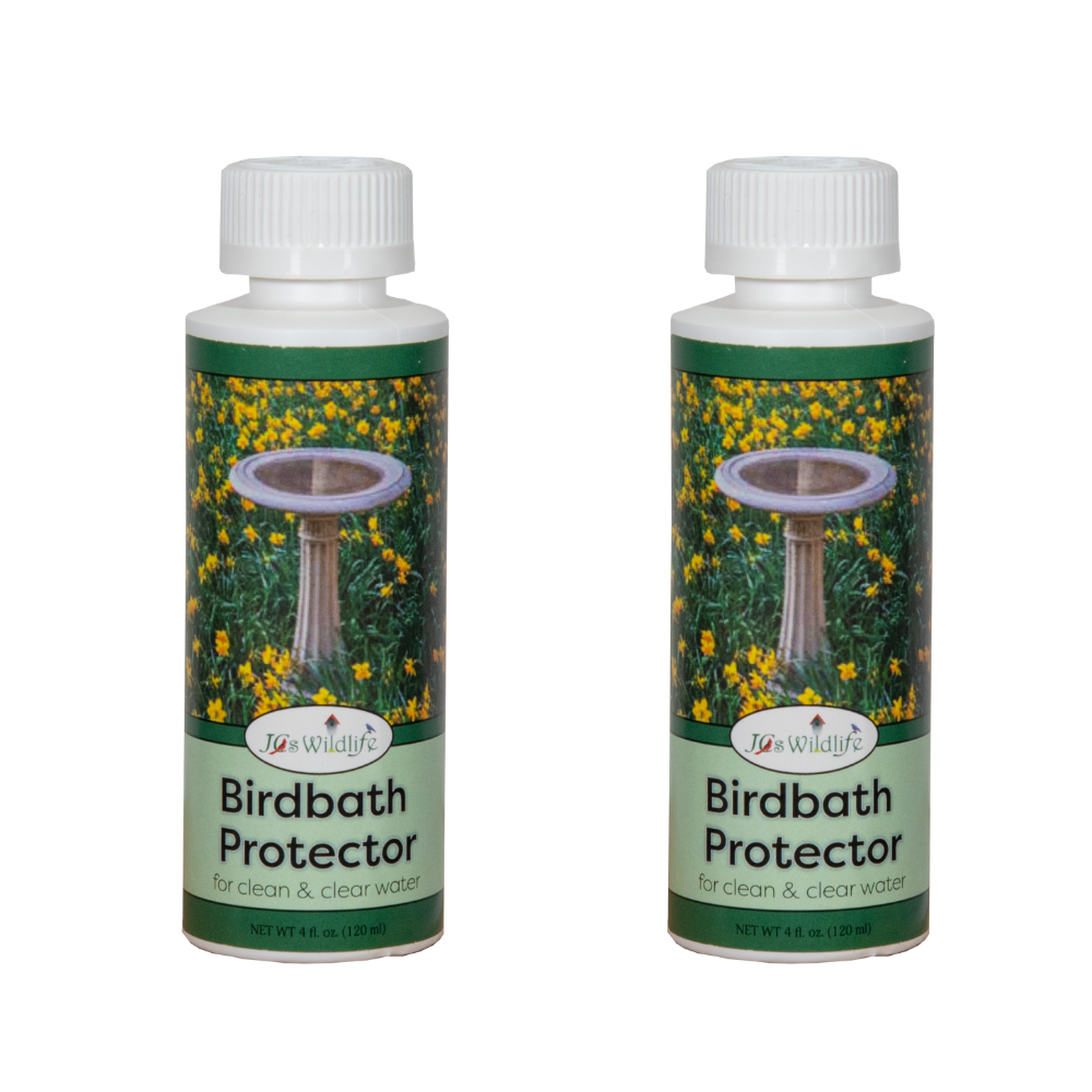 Product photography of two J&S Wildlife Birdbath Protector bottles showing a stone birdbath nestled amongst vibrant yellow daffodils and green grass on the label.
