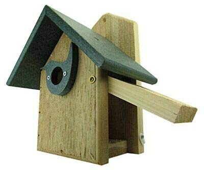 Wooden birdhouse with a dark gray roof and a light wood slide featuring a bird-shaped entrance hole and brass colored screws