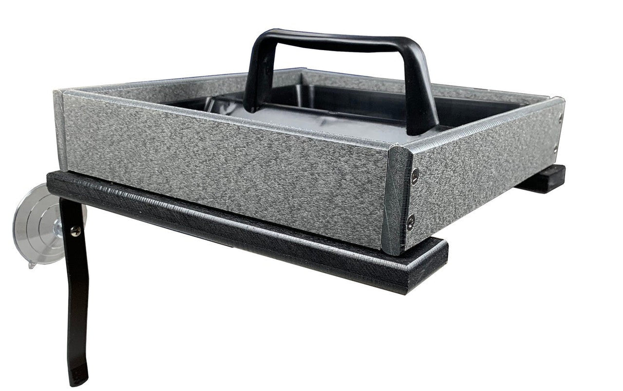 Product shot of a gray and black plastic bird feeder with a handle and suction cup mount showing textured surfaces visible screws and a dark tray