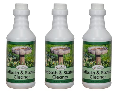 JCS Wildlife Birdbath & Statuary Cleaner 16 oz. Spray bottles in garden setting, perfect for keeping birdbaths clean.