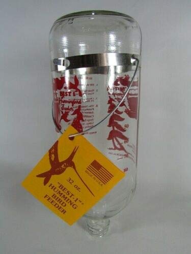 Glass Best-1 hummingbird feeder featuring a red and white design of hummingbirds and trees with a silver metal band and a yellow label.