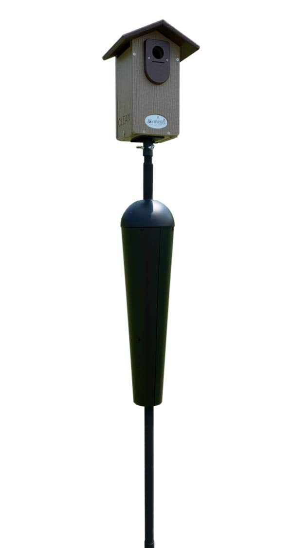 Studio shot of a Dwain's Wildlife birdhouse mounted on a black pole with a dark gray predator guard a clean design and a brown roof