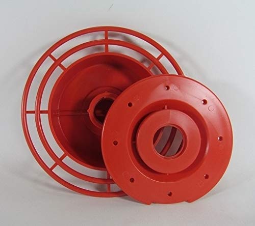 Plastic hummingbird feeder disassembled showing bright red base and perch with concentric rings and small holes