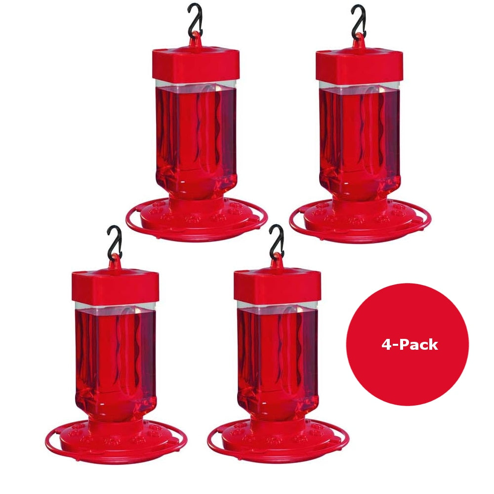 Product image showing four red plastic hummingbird feeders with clear reservoirs filled with red nectar and featuring black hanging hooks