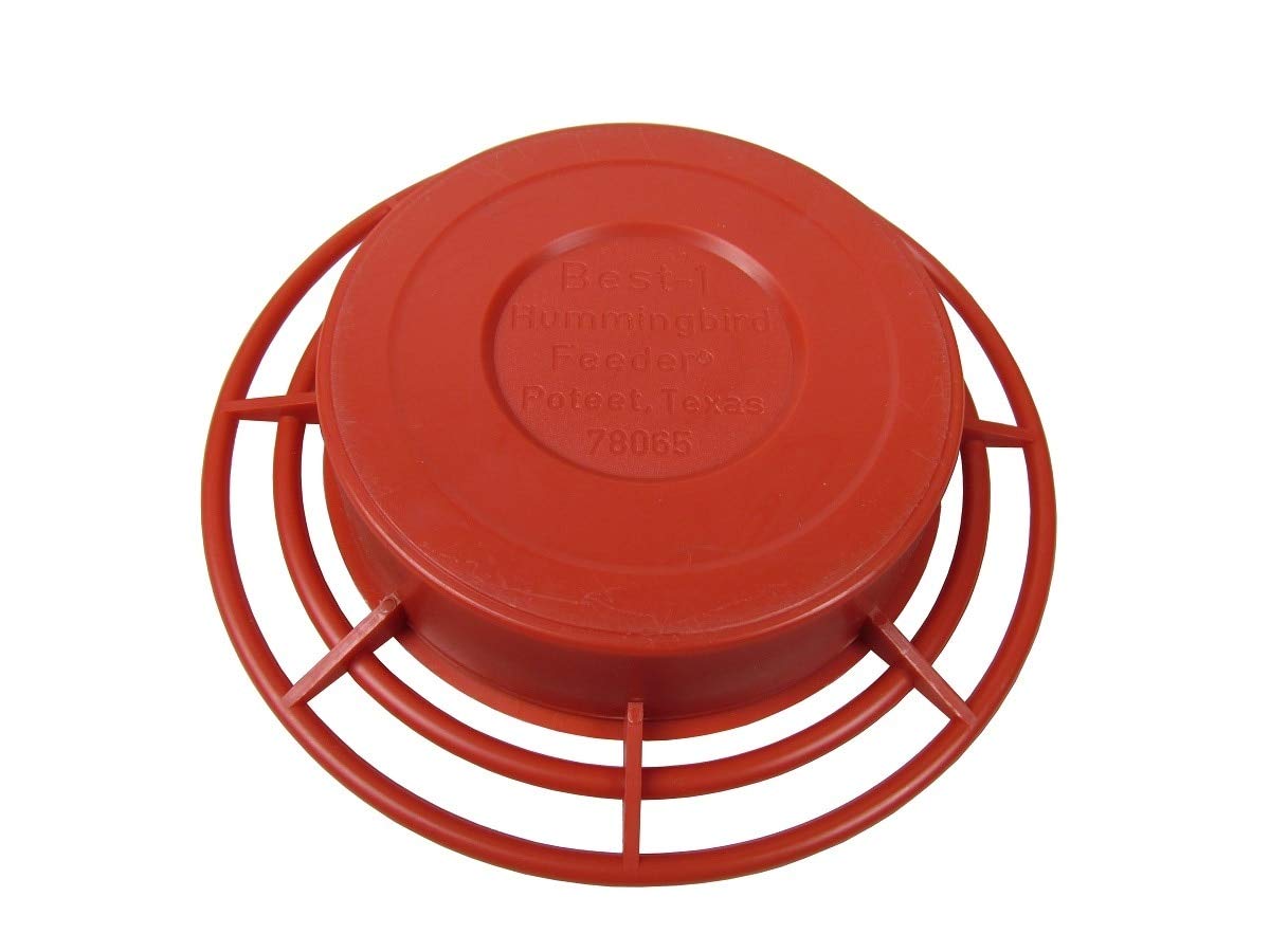 Plastic Best-1 Hummingbird Feeder from Poteet Texas shows a vibrant red color a circular design and imprinted text