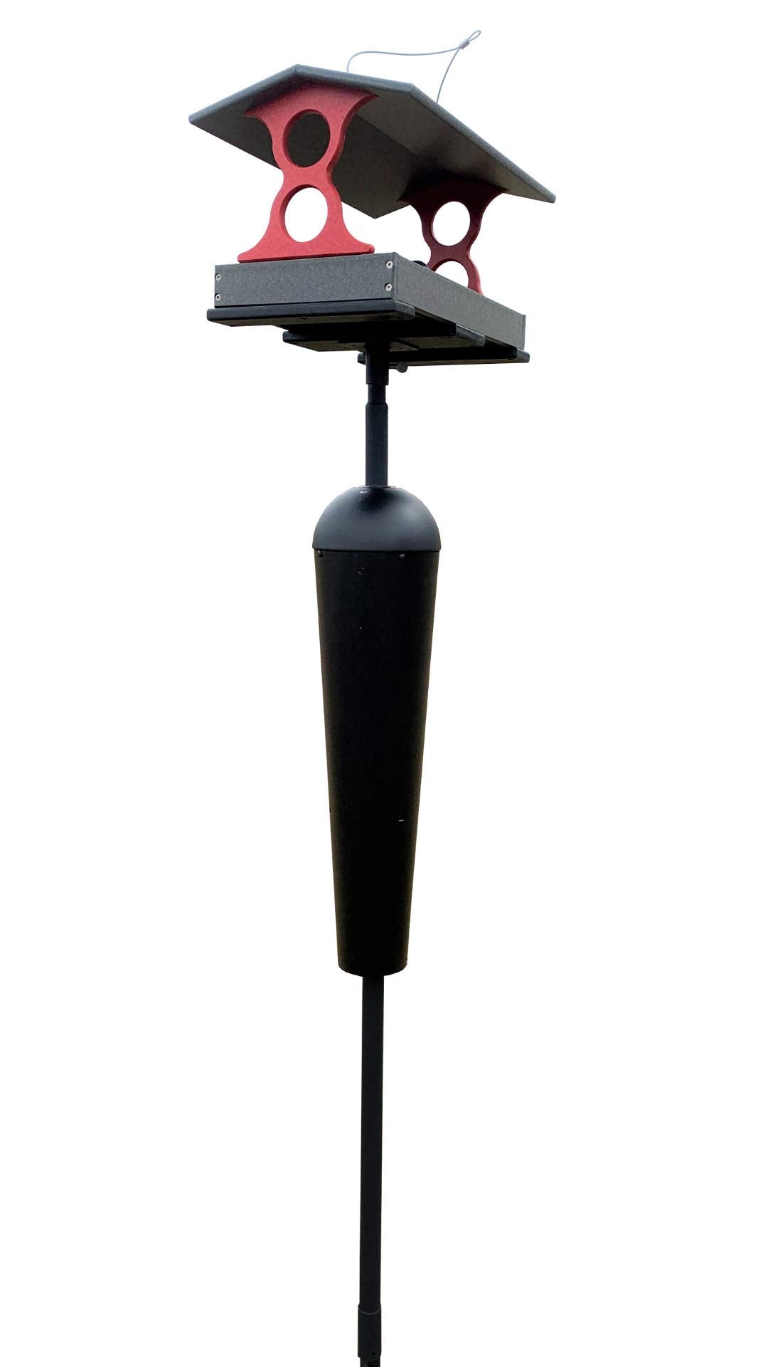 Product shot of a gray and red bird feeder with a black pole and reservoir against a white background featuring a sloped roof, circular cutouts and a textured tray.