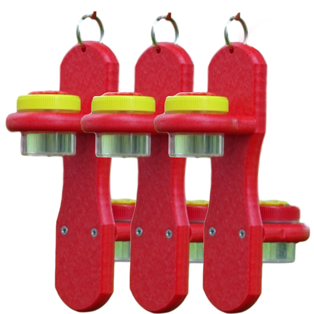 Product shot showing three red plastic bee feeders with yellow and silver containers against a white background