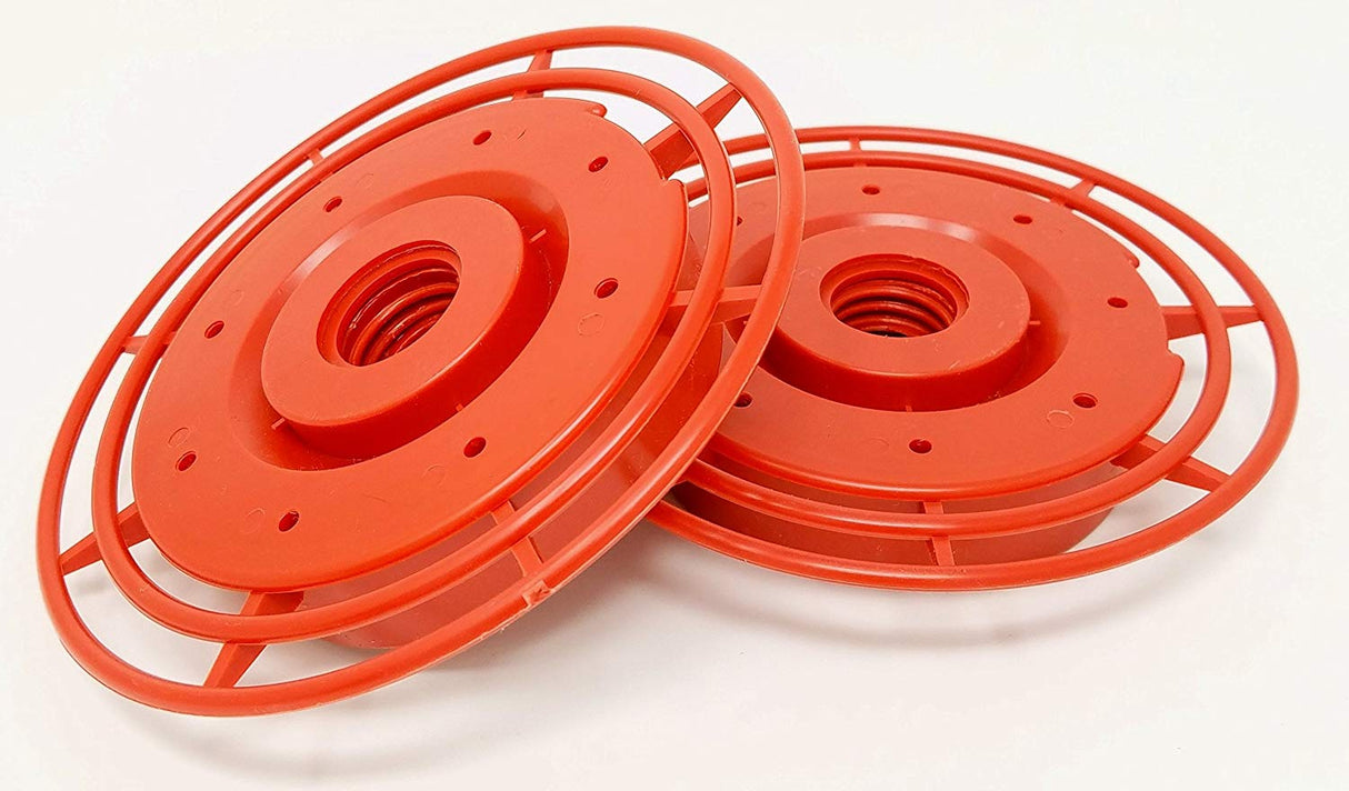 Plastic hummingbird feeder parts bright orange color with concentric circles and small holes for easy assembly and cleaning.