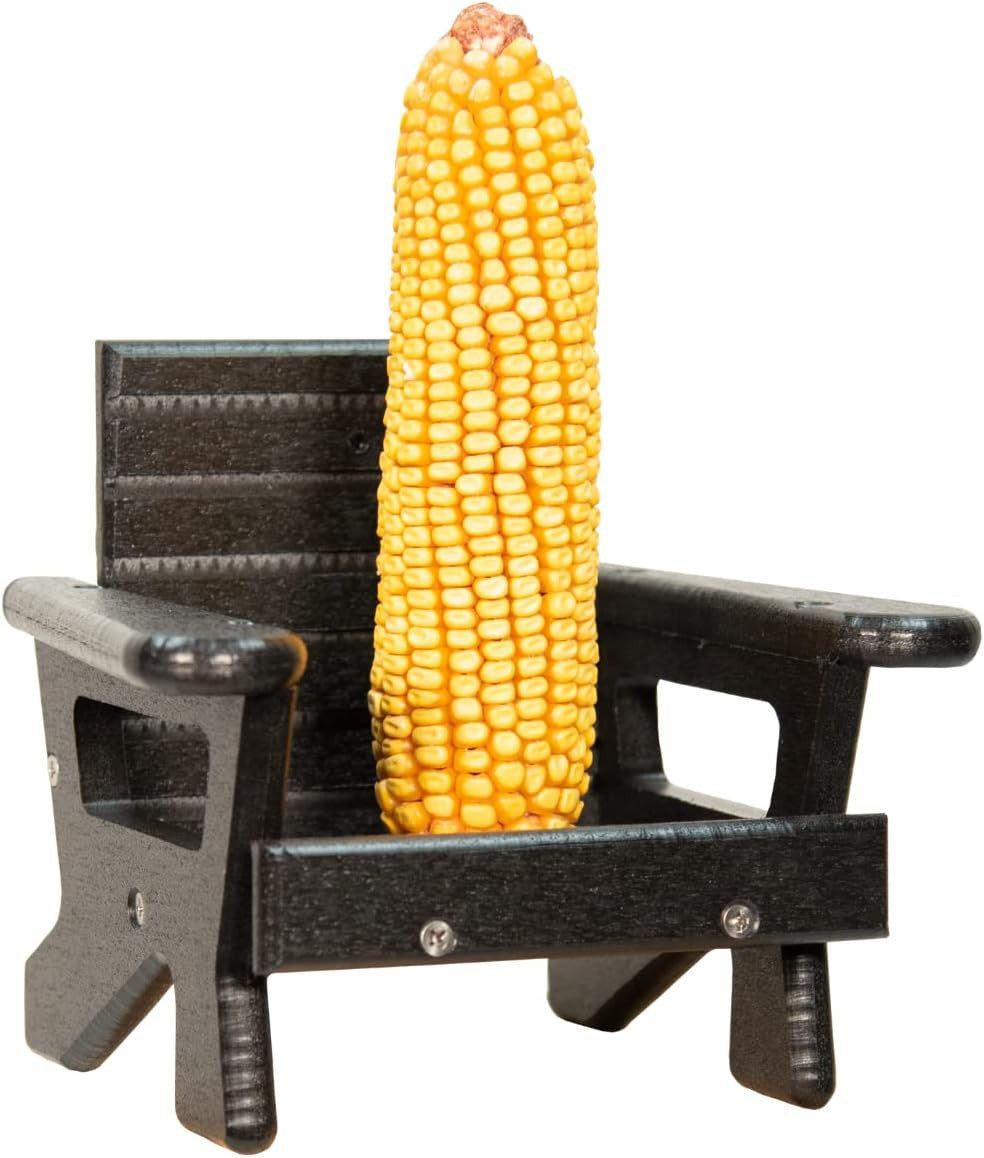 JCS Wildlife Black Squirrel Chair Feeder holding one ear of corn for squirrels, perfect for backyard feeding.
