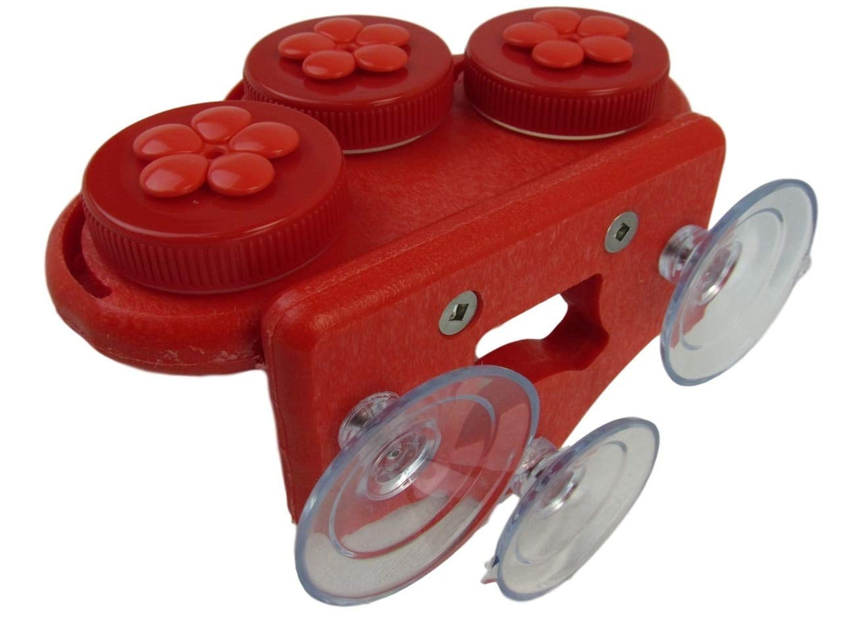Red plastic three-bottle holder with flower-shaped tops and clear suction cups for vehicle mounting