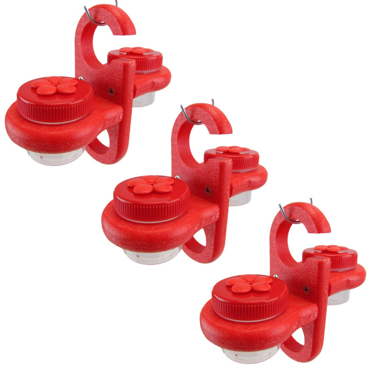 Product shot showing three bright red plastic hummingbird feeders with flower-shaped lids and clear jars against a white background