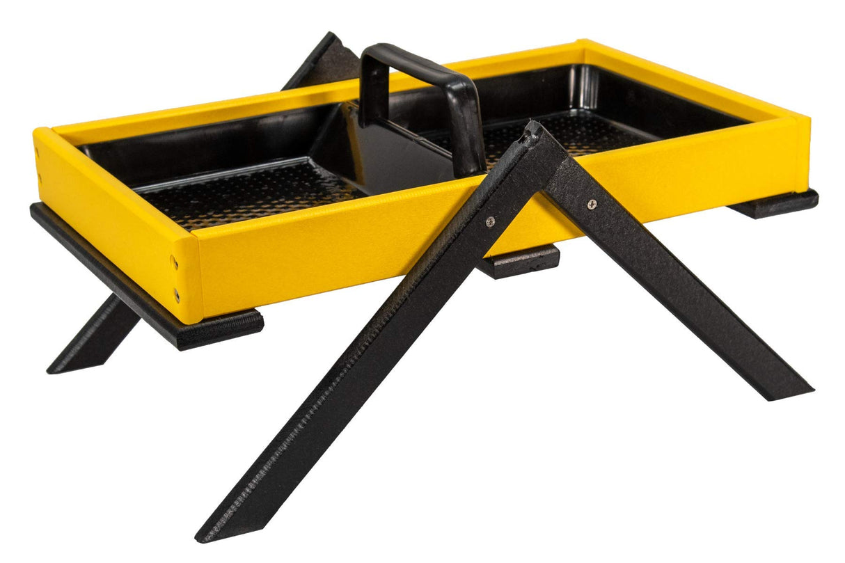 Product photography showing a yellow and black bird feeder with a textured black tray, a convenient carrying handle, and sturdy black legs with rubber feet