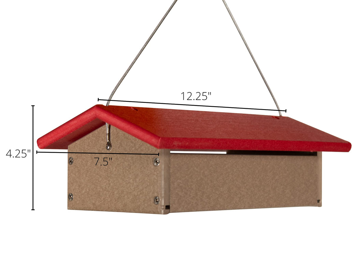 Product shot of a red and beige plastic bird feeder hanging from a wire featuring a sloped roof and visible screws