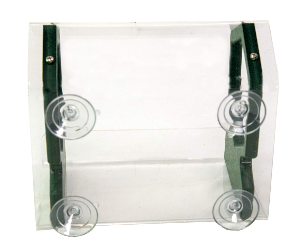 Product shot of a clear acrylic hummingbird feeder with dark green accents and four suction cups for window mounting showing small screws and a minimalist design