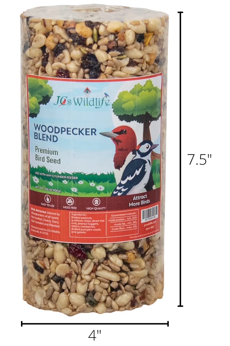 JCs Wildlife Woodpecker Blend premium bird seed cylinder featuring red-headed and downy woodpeckers, sunflower chips, and cranberries against a tree backdrop