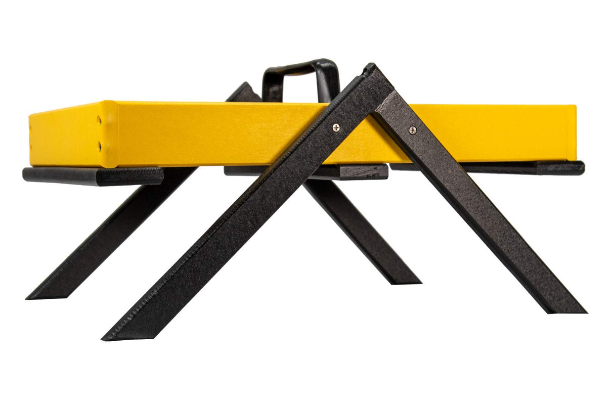 Product photography of a yellow and black wooden tray with a handle and foldable legs showcasing its vibrant color and sturdy construction