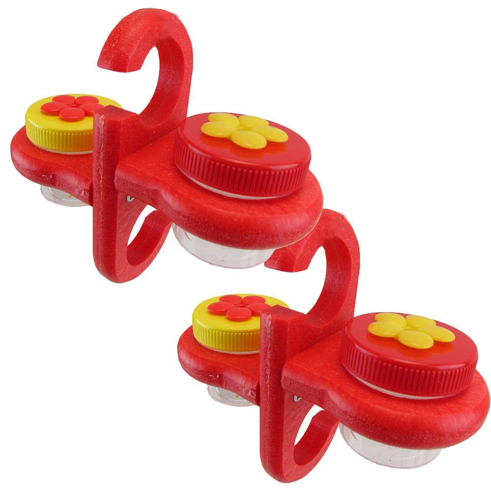 Product photography showing two red hummingbird feeders with yellow and red flower-shaped lids and clear jars against a white background