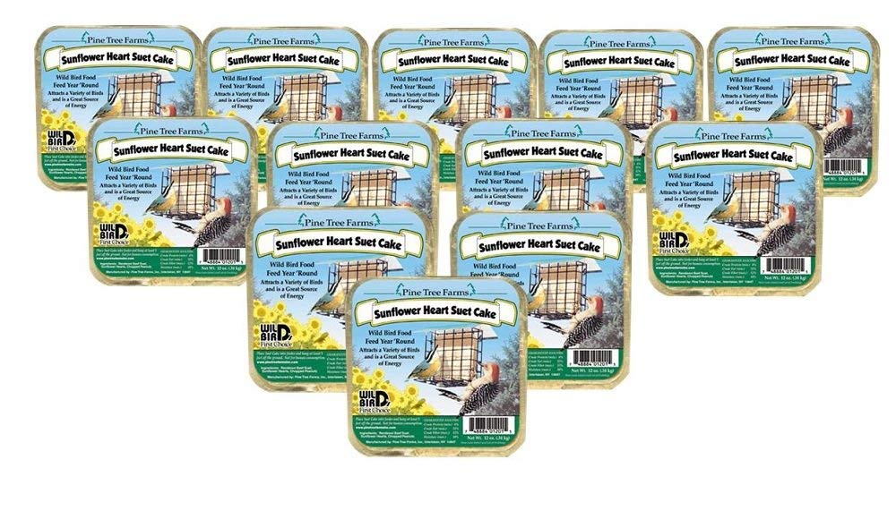 Pine Tree Farms twelve Sunflower Heart Suet Cakes featuring birds at a bird feeder, snowy ground, and vibrant yellow sunflowers showcasing a convenient package design