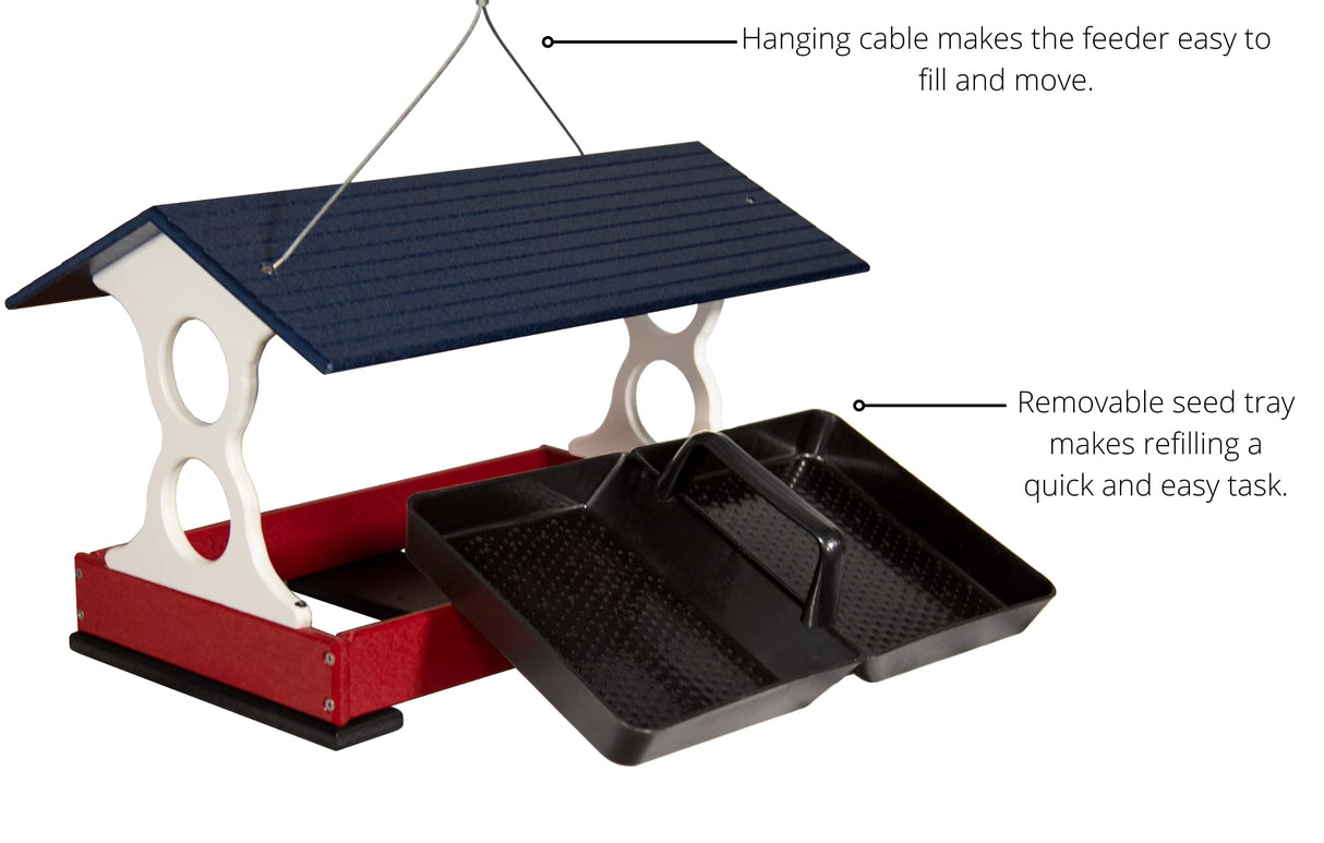 Product shot of a red and navy blue bird feeder with removable trays and a hanging cable showing textured surfaces and subtle details