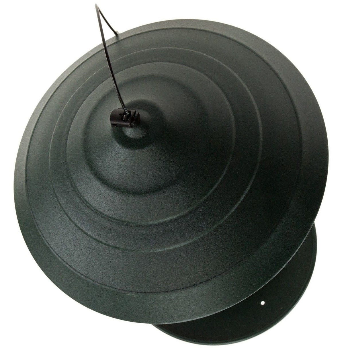 Product photography of a dark green metal bird feeder with a hanging wire and concentric circular ridges showing a small black plastic clip detail