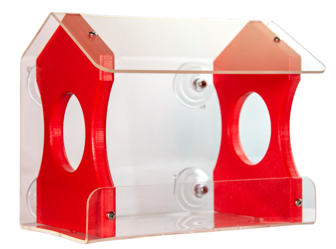 Acrylic bird feeder with red accents and clear panels showing suction cup attachments and two feeding holes showcasing a modern design