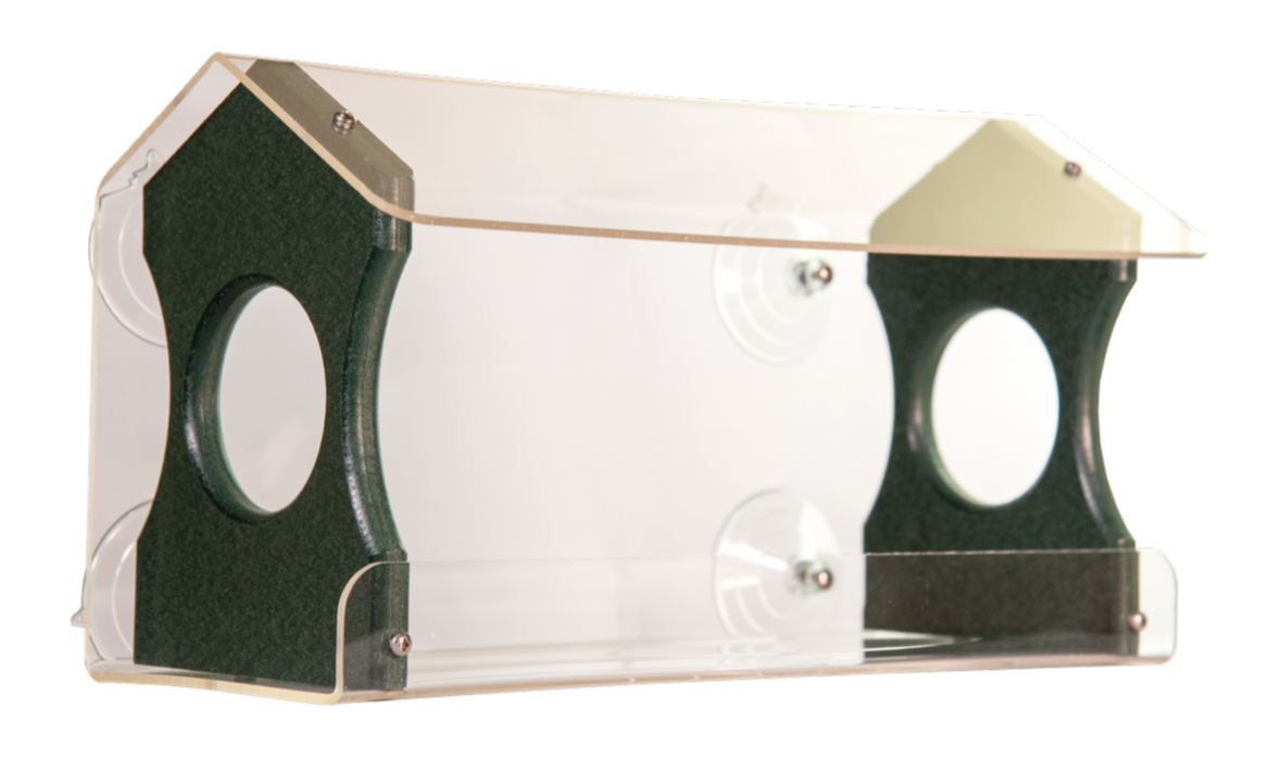 Product shot of an acrylic and dark-green plastic bird feeder featuring two feeding ports, suction cups for window mounting, and a clear protective roof.