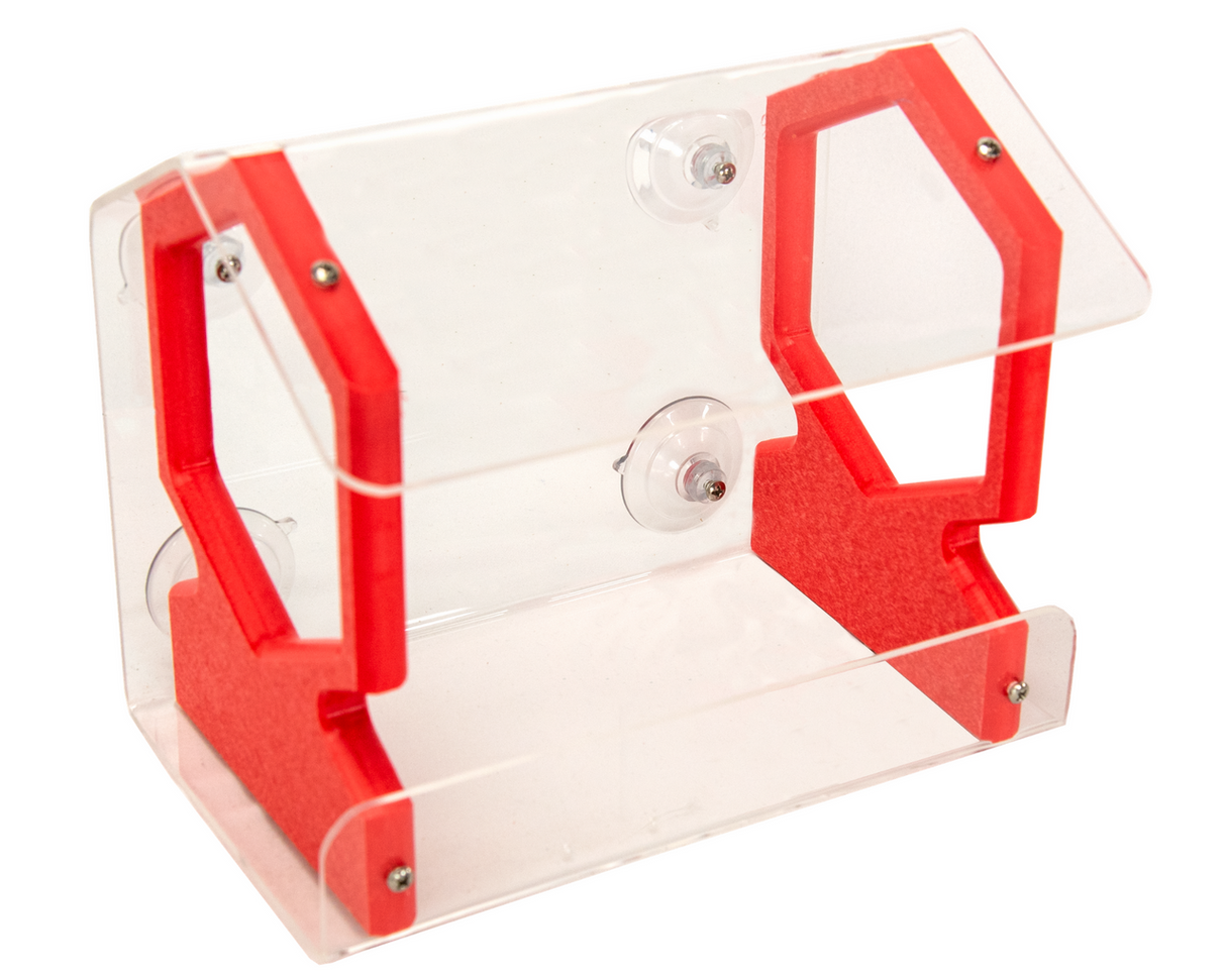 Product shot of an acrylic and red plastic bird feeder with suction cups featuring hexagonal cutouts and small screws