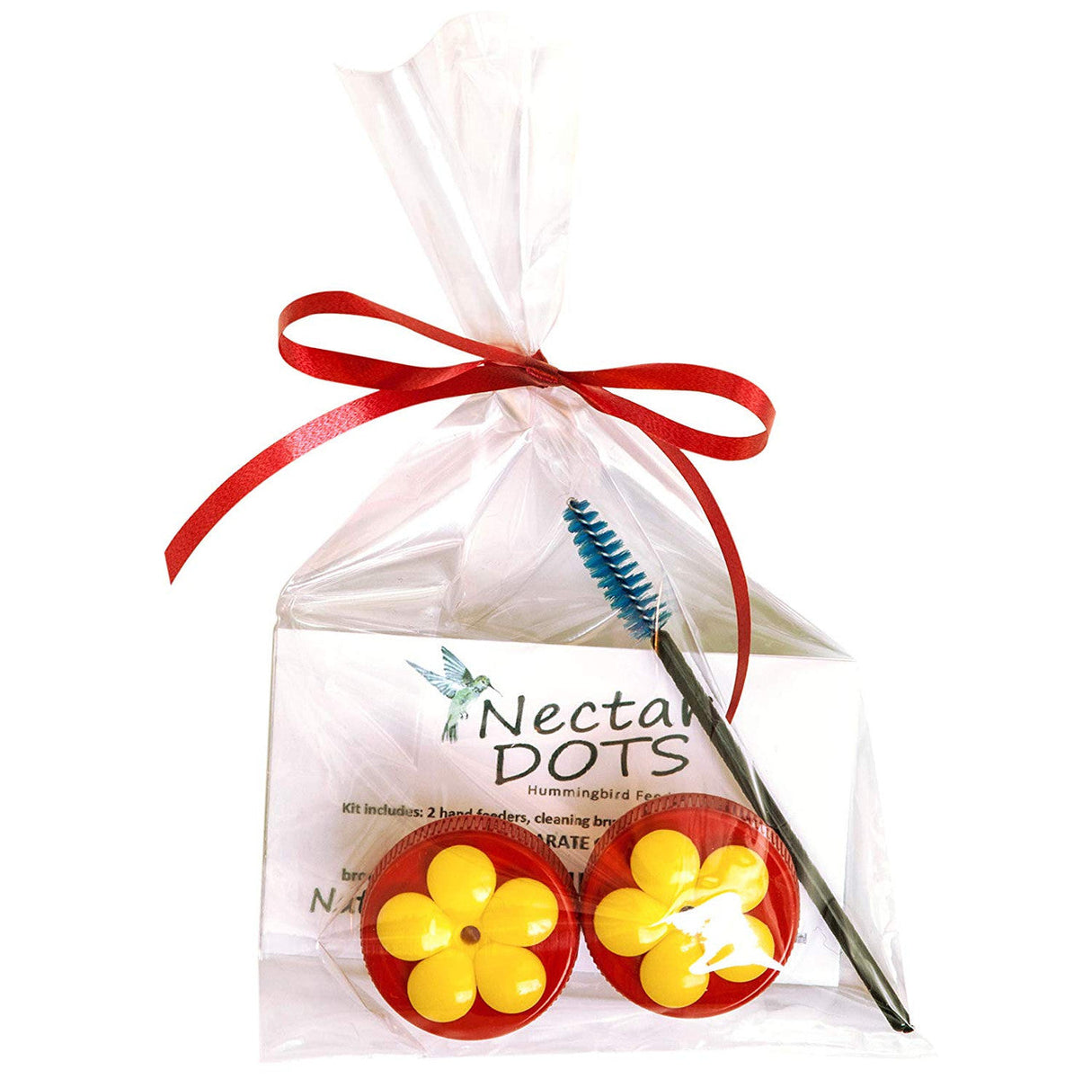 Product Photography: Nectar Dots hummingbird feeder kit featuring two red and yellow flower-shaped feeders a cleaning brush and a red ribbon