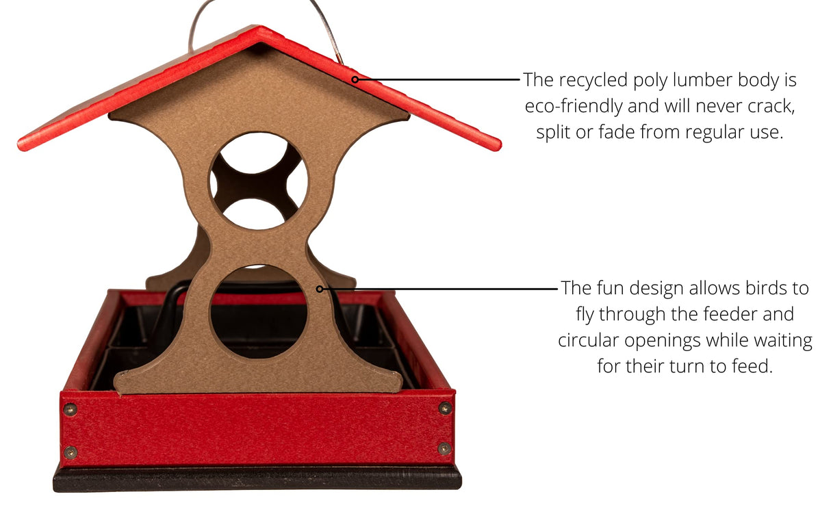 Recycled poly lumber bird feeder with red roof and brown body featuring circular openings and a tray base showing a unique design