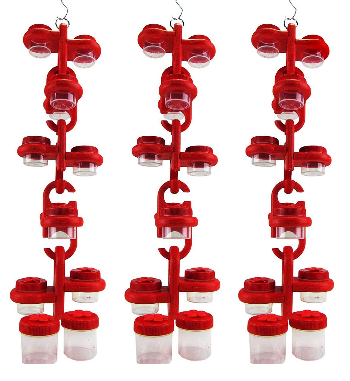 Product shot of two red plastic hummingbird feeders with multiple small clear jars hanging from a central hook featuring bright red caps and clear containers