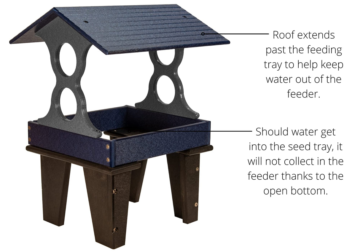 Plastic bird feeder with a dark blue tray, gray roof, and black legs showcasing a protective overhang and an open bottom for drainage