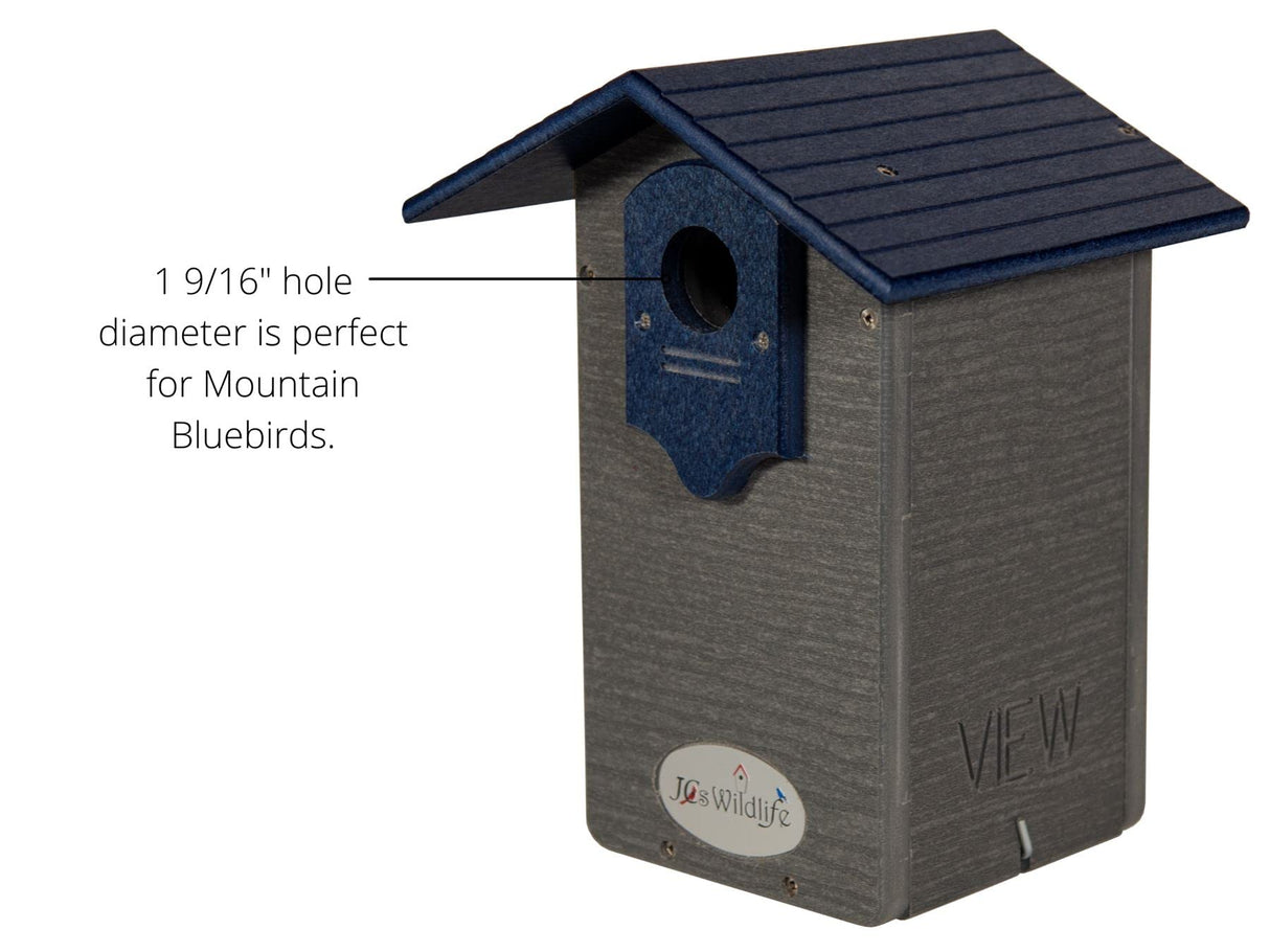 JQs Wildlife gray and blue plastic birdhouse for Mountain Bluebirds featuring a 1 9/16 inch entrance hole a dark blue roof and a  decorative entrance panel