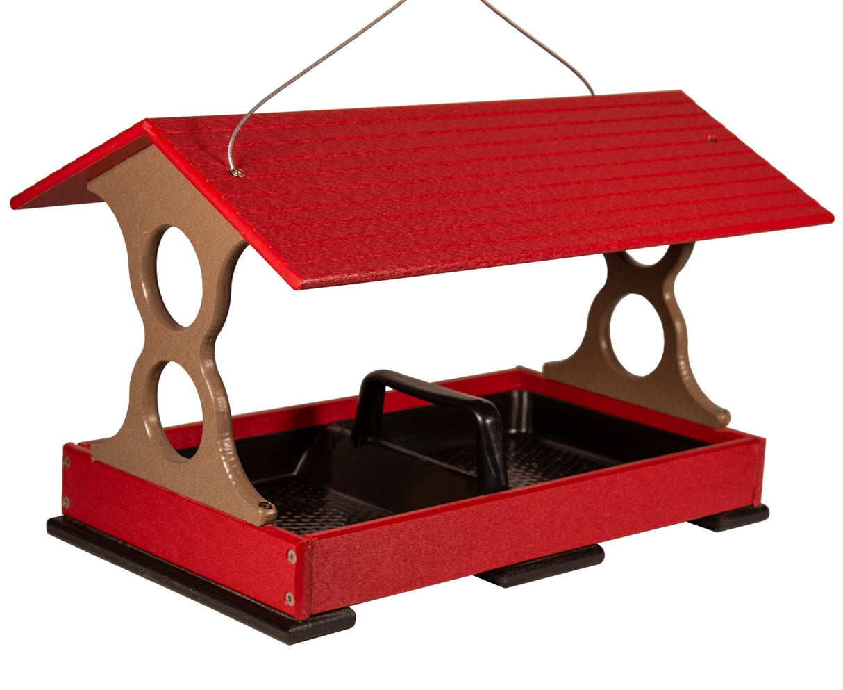 Plastic bird feeder red and taupe with a black tray and textured roof hanging from a wire