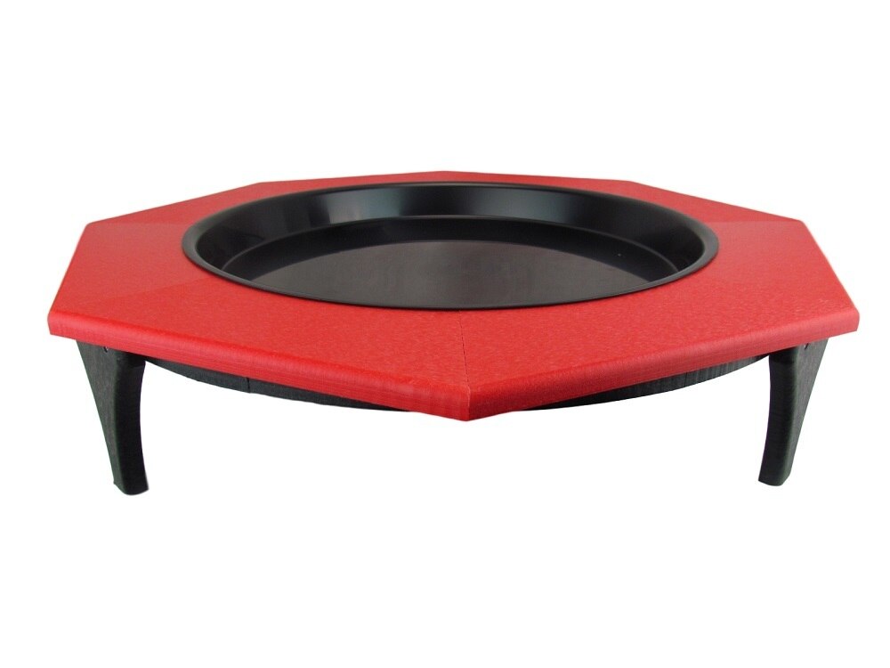 Product photography showing a red and black octagonal plastic bird bath with a raised rim and short legs.