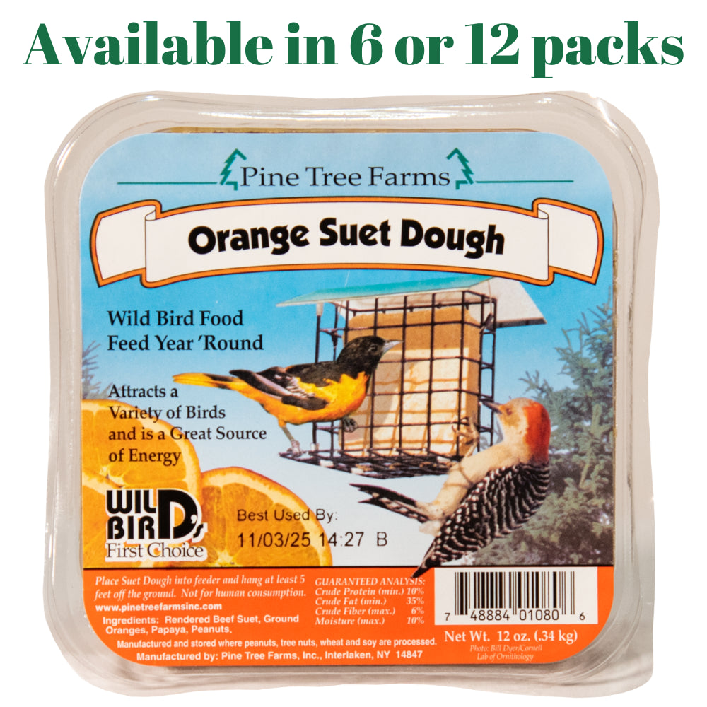 Pine Tree Farms product label showing an orange suet dough in a wire feeder with a Baltimore Oriole and a Downy Woodpecker vibrant orange suet and a blue background