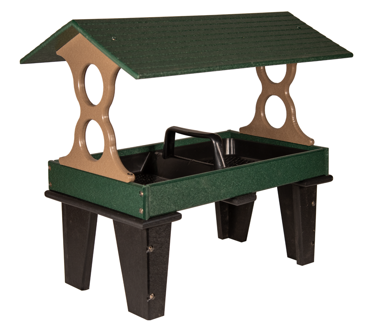 Plastic bird feeder with green roof tan supports and black legs showing a raised tray and protective overhang