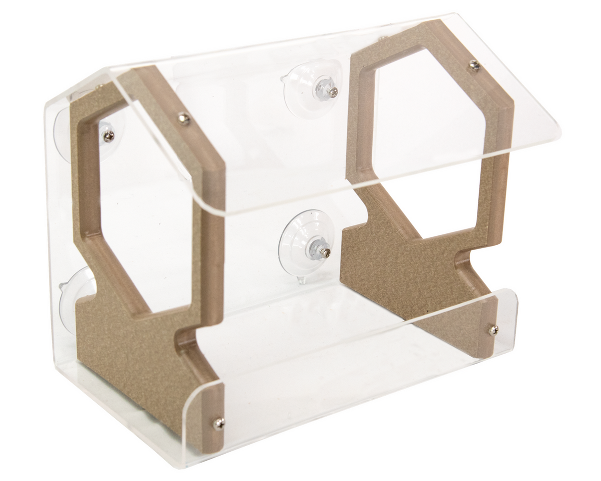 Product shot of an acrylic and composite bird feeder with suction cups featuring hexagonal cutouts and taupe accents showing a clear plastic design and metallic fasteners